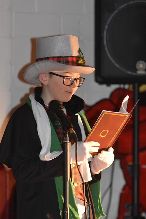 Student Performing A Christmas Carol