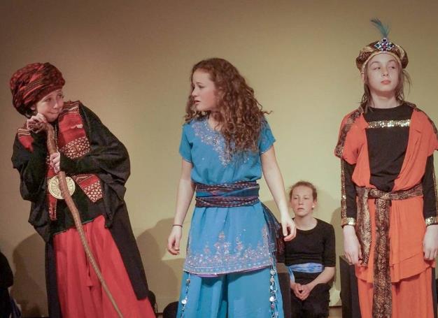 Performance by students in Aladdin script.