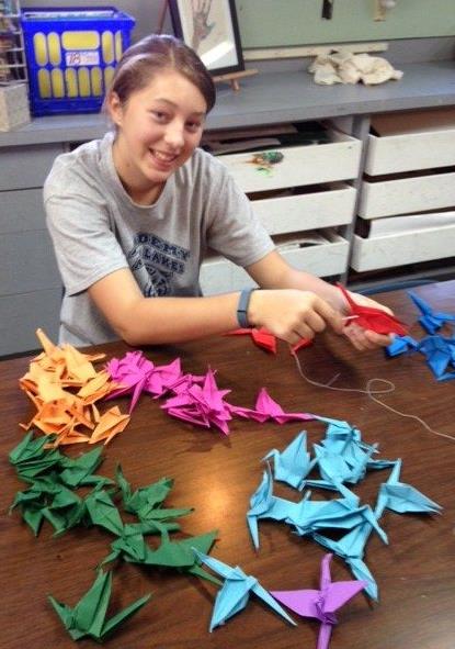 Kids fold A Thousand Cranes