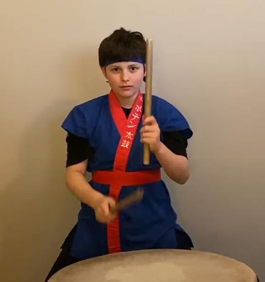 Drummer in student performance of Sadako