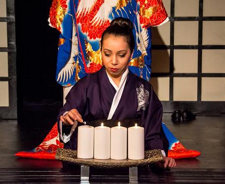 Sadako lights candles for ancestors