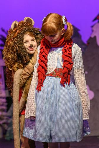 Dorothye and Lion in A Christmas Wizard of Oz