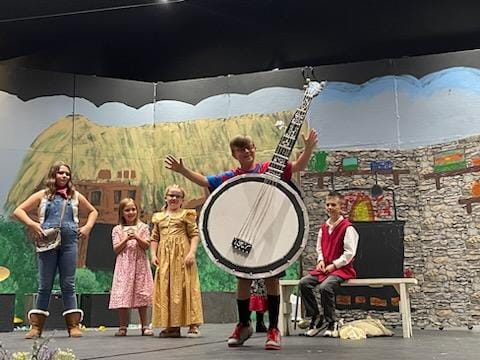 A Banjo instead of a Harp in ArtReach's playscript