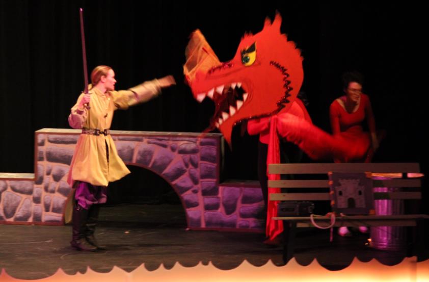 Arthur battles the dragon in Sword in the Stone